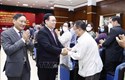 Chủ tịch Quốc hội Vương Đình Huệ gặp mặt cộng đồng người Việt Nam tại Lào